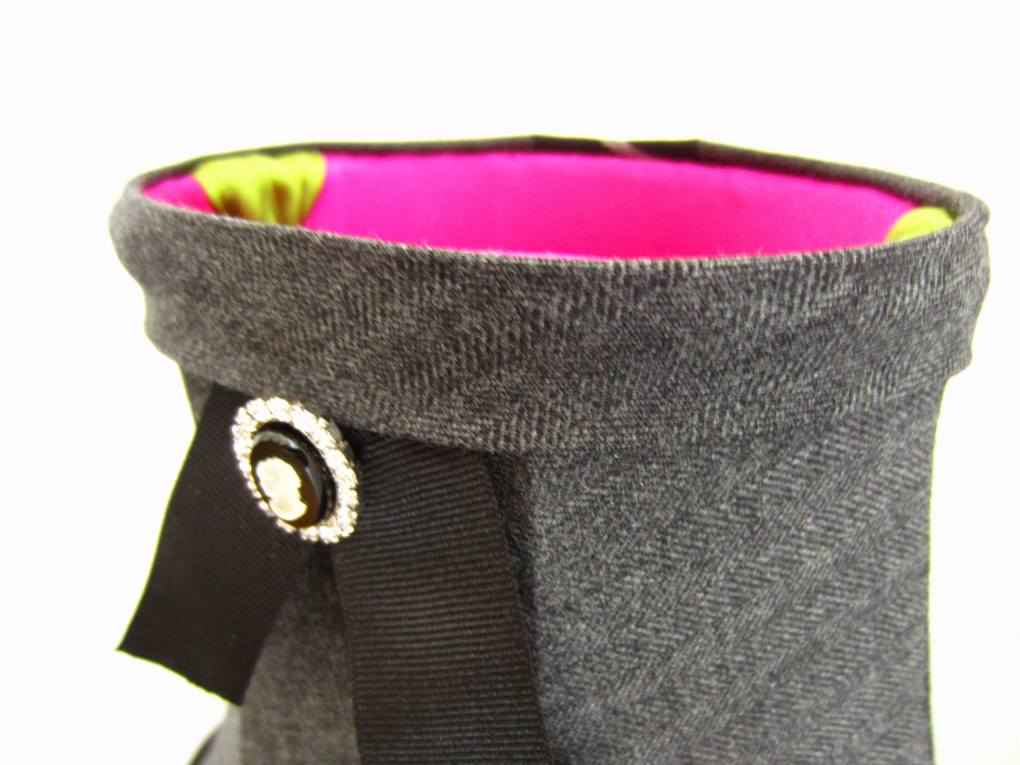 Grey lampshade with bright pink linining and lime green trimming