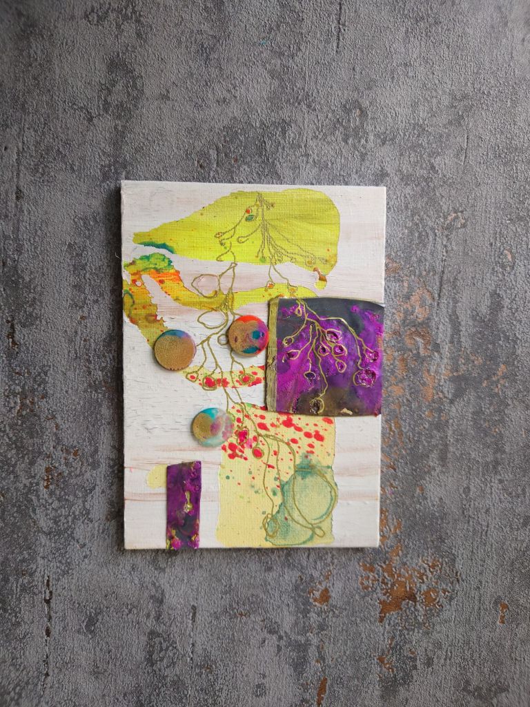 White and yellow mixed media painting on a grey concrete texture border. Painting has purple and gold marbled elements with fine gold marks 